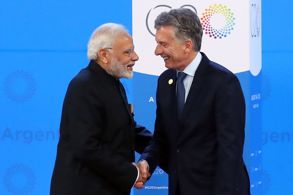 REFILE - ADDING DROPPED LETTER Indias Prime Minister Narendra Modi is welcomed by Argentinas President Mauricio Macri as he arrives for the G20 leaders summit in Buenos Aires, Argentina November 30, 2018. REUTERS/Marcos Brindicci