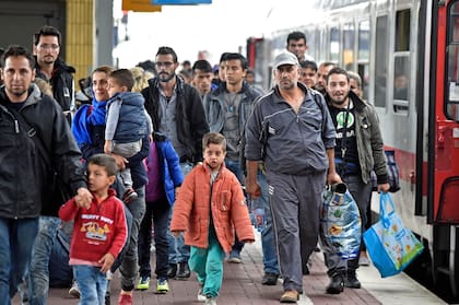 Refugiados de Siria llegan a una estación de tren en Dortmund, Alemania, el 6 de septiembre de 2015