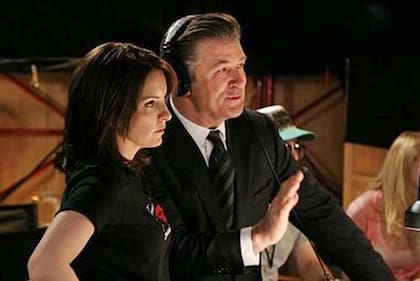 En 30 Rock, serie que lo consagró definitivamente como gran comediante, junto a Tina Fey