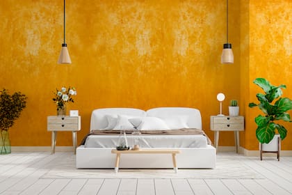 Revestimiento acrílico decorativo de efecto metalizado oro.