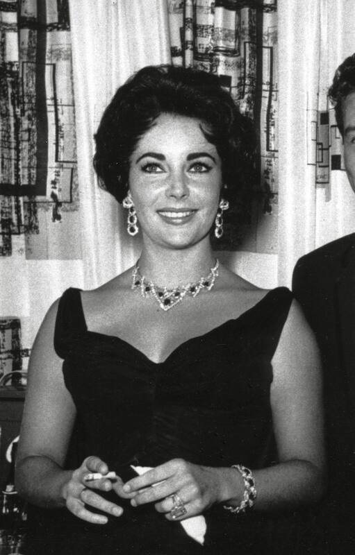 Reynolds junto a su esposo, Eddie Fisher, y su mejor amiga, Elizabeth Taylor