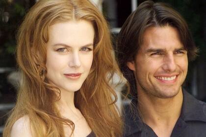RFILE--Actors Nicole Kidman and her husband Tom Cruise smile during a photocall in Paris in this Sept. 2, 1999, file photo. The 11-year marriage of Cruise and Kidman is on the rocks. "Tom Cruise and Nicole Kidman announced today that they have regretfully decided to separate," Pat Kingsley, the couple's spokeswoman, said Monday, Feb. 5, 2001. (AP Photo/Michel Euler, File)