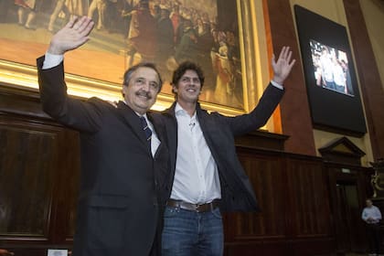 Ricardo Alfonsín y Martín Lousteau, ayer, en la Facultad de Derecho