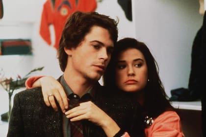 Rob Lowe y Demi Moore en una escena de ¿Te acuerdas de anoche?