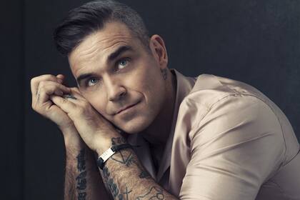 Robbie Williams tiene muy presente cuando su esposa le regaló una camiseta autografiada de Messi; para él es el mejor regalo de Navidad que recibió en su vida