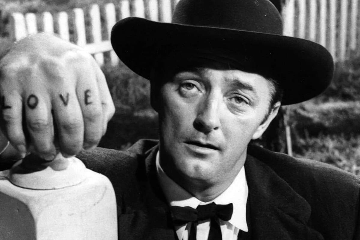 Robert Mitchum protagonizó La noche del cazador, una película que con el tiempo se volvió un clásico, pero en su estreno fue recibida fríamente tanto por la crítica como por el público