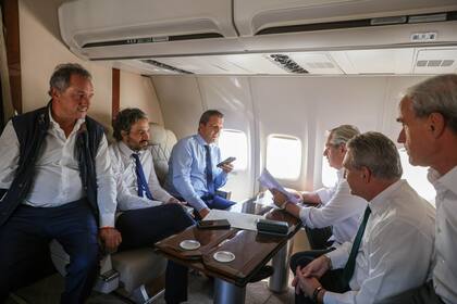 Rossi y Massa, juntos, en un reciente viaje presidencial a Brasil