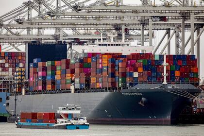 ROTTERDAM, NETHERLANDS - APRIL 4: A container cargo ship is seen in Rotterdam Harbour on April 4, 2021 in Rotterdam, Netherlands. Heavy traffic is expected in Rotterdam Harbour now that the Ever Given cargo ship has been refloated in the Suez canal. Under normal cirucmstances, 80 sea ships are entering the harbour daily. A temporary increase of 10 percent is expected from Wednesday on. (Photo by Niels Wenstedt/BSR Agency/Getty Images