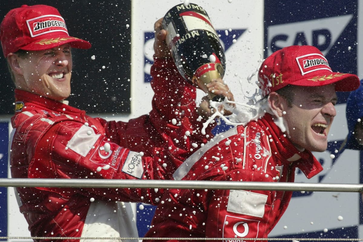 Rubens Barrichello y Michael Schumacher en Indianapolis Motor Speedway, 29 de septiembre de 2002