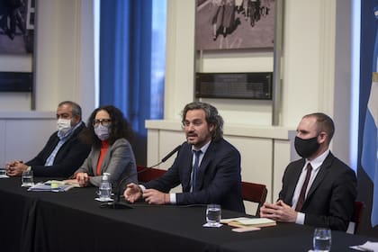 Santiago Cafiero y Martín guzmán