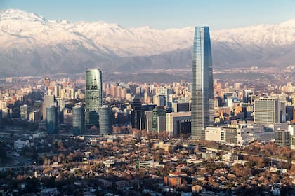 Santiago de Chile, Chile - Aug, 25th, 2014. The city and the Cordillera de los Andes mountains covered with snow in the background, Santiago de Chile.