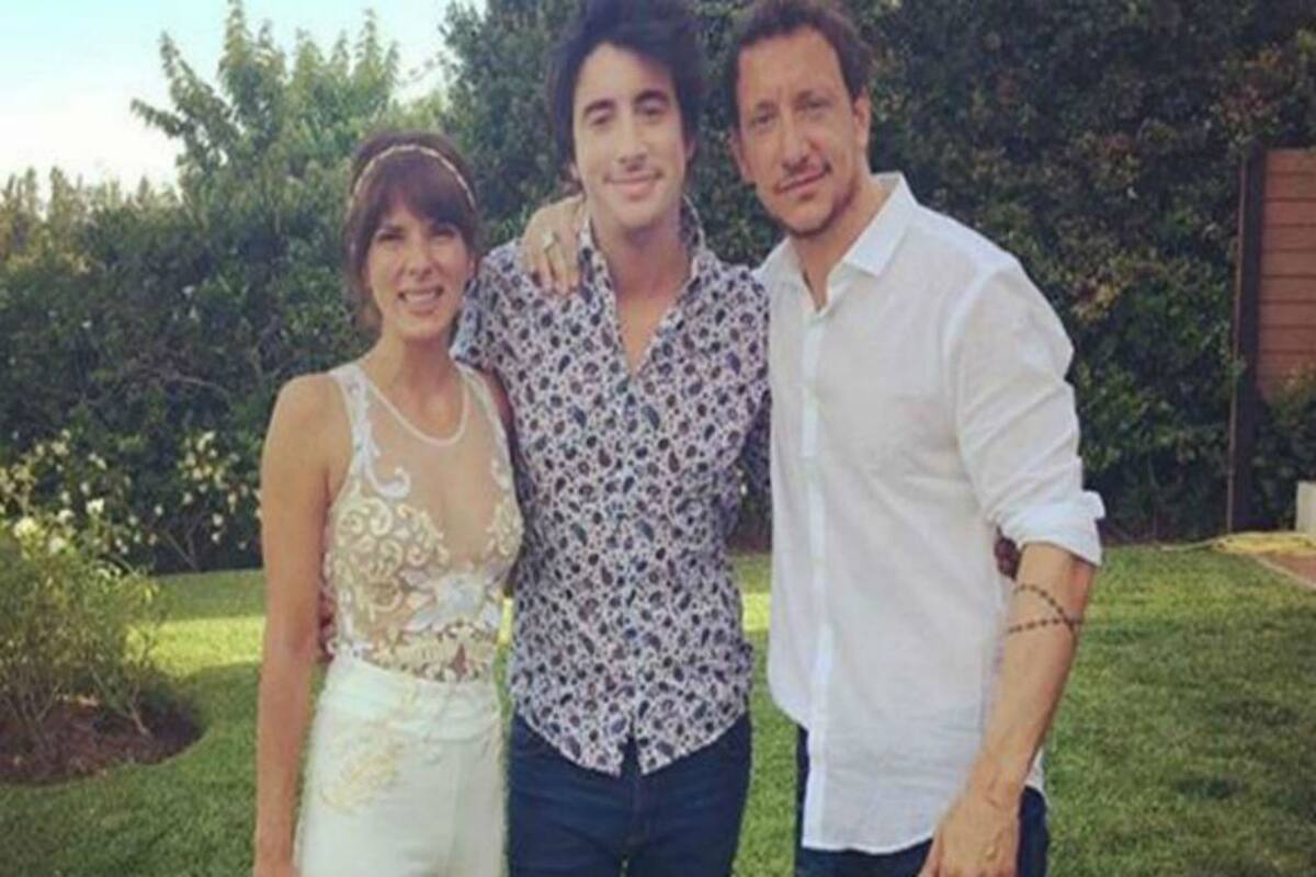 Santiago Vázquez, junto a su hermano Nicolás y su esposa Gimena Accardi.