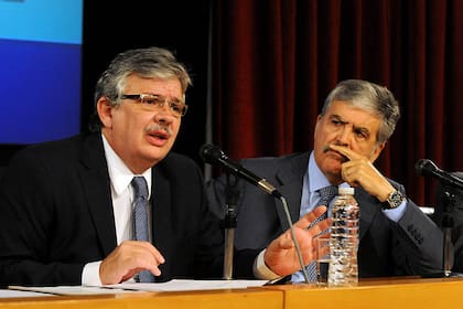 Schiavi junto al Ministro De Vido