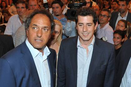 Daniel Scioli y Eduardo "Wado" de Pedro, durante un acto en Mercedes, en junio de 2020