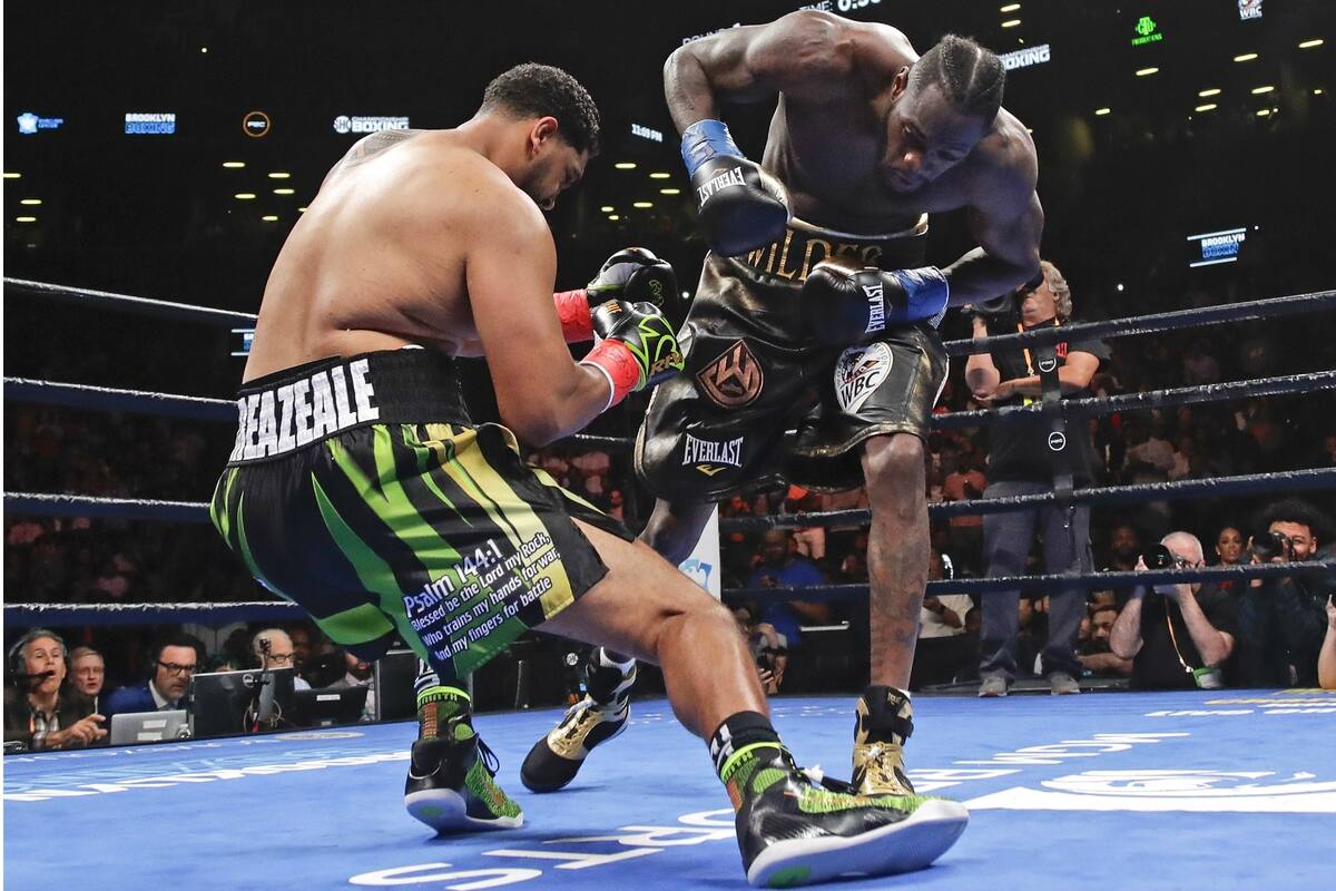 Se derrumba Dominic Breazeale tras la combinación demoledora de Deontay Wilder, en el primer round