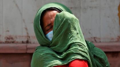 Se ve dolor y frustración a medida que los casos diarios de coronavirus en India alcanzan otro récord mundial