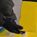 Bajo una lona y tras bidones de combustible para despistar ocultaban 407 kilos de cocaína