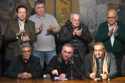 Acuña, Schmid y Daer, el triunvirato de mando de la CGT; Schmid renunció en 2018
