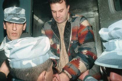 Sergio Camaratta era policía; ayudó a los "horneros" a planear y llevar a cabo el crimen; estuvo detenido desde 1997 a 2006, cuando salió beneficiado por el 2x1; murió en 2015