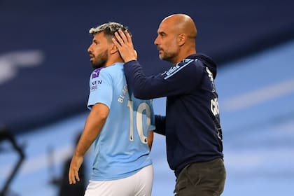 Sergio "Kun" Aguero y Pep Guardiola vislumbran la llegada de Lionel Messi al Manchester City