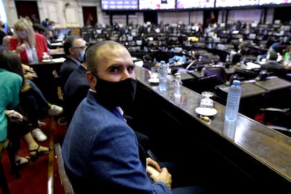 Sergio Massa y Martín Guzmán en el debate por el impuesto a las fortunas, en Diputados