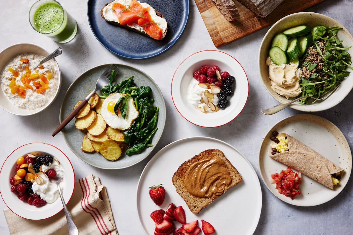 Several healthy breakfasts on a tabletop in New York, April 18, 2023. The ideal breakfast is the one that makes you feel your best, experts say, though there are some important nutrients to keep in mind. (Bobbi Lin/The New York Times)
