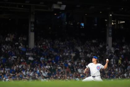 Shota Imanaga, de los Cachorros de Chicago, lanza en el juego del miércoles 4 de septiembre de 2024, ante los Piratas de Pittsburgh (AP Foto/Charles Rex Arbogast)