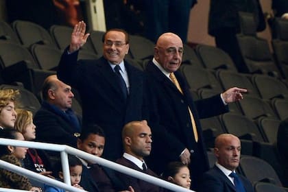 Silvio Berlusconi junto a Adriano Ganniani