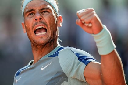 Spain's Rafael Nadal celebrates a point against David Goffin of Belgium during their match at the Mutua Madrid Open tennis tournament in Madrid, Spain, Thursday, May 5, 2022. (AP Photo/Manu Fernandez)