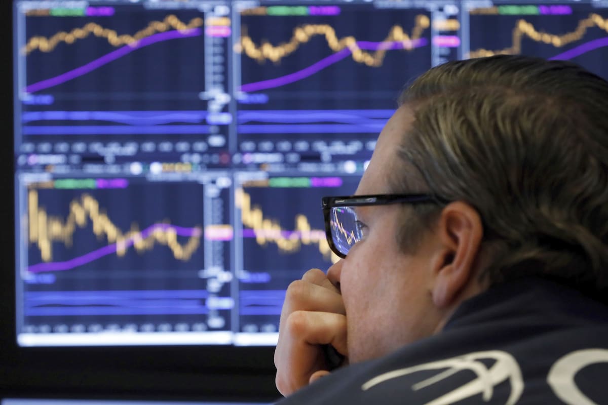 Specialist Gregg Maloney watches the screens at his post on the floor of the New York Stock Exchange, Tuesday, Jan. 28, 2020. Stocks are moving broadly higher on Wall Street in afternoon trading Tuesday, reversing most of the indexes losses from a sell-off the day before.