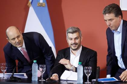 Sturzenegger, Peña y Dujovne, ayer, durante la conferencia de prensa en Casa Rosada, en la que anunciaron cambios en las metas de inlfación