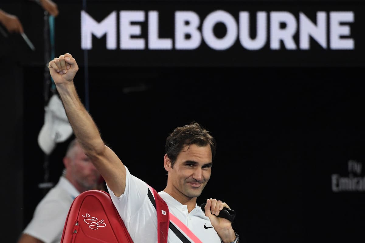 Switzerland''s Roger Federer waves after South Korea''s Chung Hyeon retired from their men''s singles semi-finals match on day 12 of the Australian Open tennis tournament in Melbourne