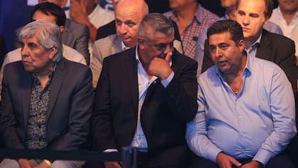 Tapia, secundado por Angelici y Moyano