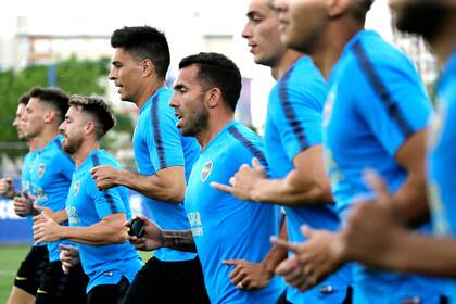 Tevez, en el centro del grupo