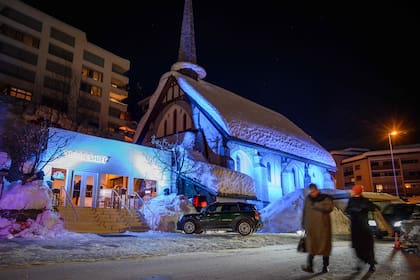 The Freie Evangelische Gemeinde, or the English Church is seen on Janury 21, 2019 during the World Economic Forum annual meeting in Davos. - The church, is one of more than a dozen buildings in the town that have been rented out to multinational corporations for events during the annual World Econom