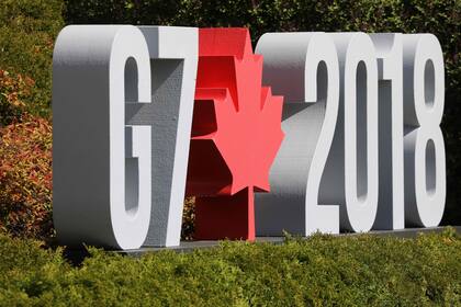 The G7 logo is seen during the G7 Summit in in La Malbaie, Quebec, Canada, June 8, 2018. / AFP PHOTO / Ludovic MARIN