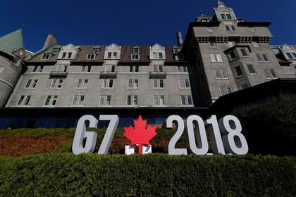 The G7 sign is lit up early in the morning before the start of the G7 Summit in the Charlevoix city of La Malbaie, Quebec, Canada, June 8, 2018. REUTERS/Yves Herman