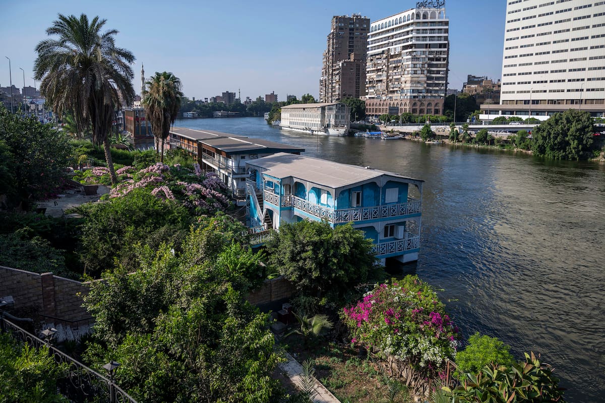 The houseboat home of Ekhlas Helmy, which she built about 20 years ago with her husband, on the Nile River in Cairo, June 28, 2022. The government this month suddenly ordered the destruction of 32 houseboats — some with storied ties to the capital’s creative, wealthy and government elite in time’s past — along a narrow stretch of the Nile that has been lined with floating homes since the 1800s. (Heba Khamis/The New York Times)