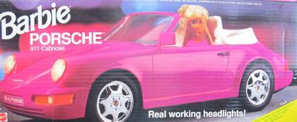 This Barbie drives a Porsche 911 Cabriolet.