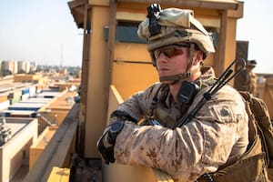 This handout image released courtesy of the US Department of Defense (DOD) shows US Marines with 2nd Battalion, 7th Marines, assigned to the Special Purpose Marine Air-Ground Task Force-Crisis Response-Central Command (SPMAGTF-CR-CC) 19.2, reinforcing the Baghdad Embassy Compound in Iraq on January
