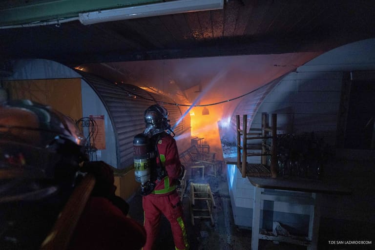 This handout photograph taken by T. de San Lazaro and released by the Brigade des Sapeurs Pompiers de Paris (BSPP) on October 12, 2026, shows firefighters working to extinguish a fire at «Le marche des Enfants Rouges» (Red Children market), center of Paris. (Photo by Handout / Brigade des Sapeurs Pompiers de Paris (BSPP) / AFP) / RESTRICTED TO EDITORIAL USE - MANDATORY CREDIT "AFP PHOTO / - / HANDOUT / BSPP / T. de San Lazaro " - NO MARKETING NO ADVERTISING CAMPAIGNS - DISTRIBUTED AS A SERVICE TO CLIENTS