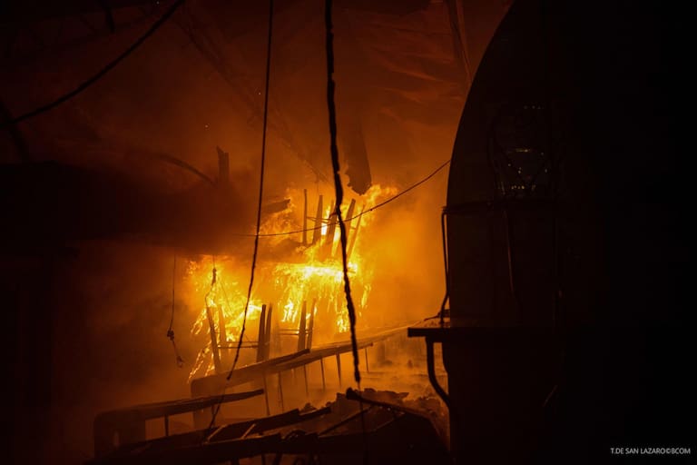 This handout photograph taken by T. de San Lazaro and released by the Brigade des Sapeurs Pompiers de Paris (BSPP) on October 12, 2026, shows the fire inside the «Le marche des Enfants Rouges» (Red Children market), center of Paris. (Photo by Handout / Brigade des Sapeurs Pompiers de Paris (BSPP) / AFP) / RESTRICTED TO EDITORIAL USE - MANDATORY CREDIT "AFP PHOTO / - / HANDOUT / BSPP / T. de San Lazaro " - NO MARKETING NO ADVERTISING CAMPAIGNS - DISTRIBUTED AS A SERVICE TO CLIENTS