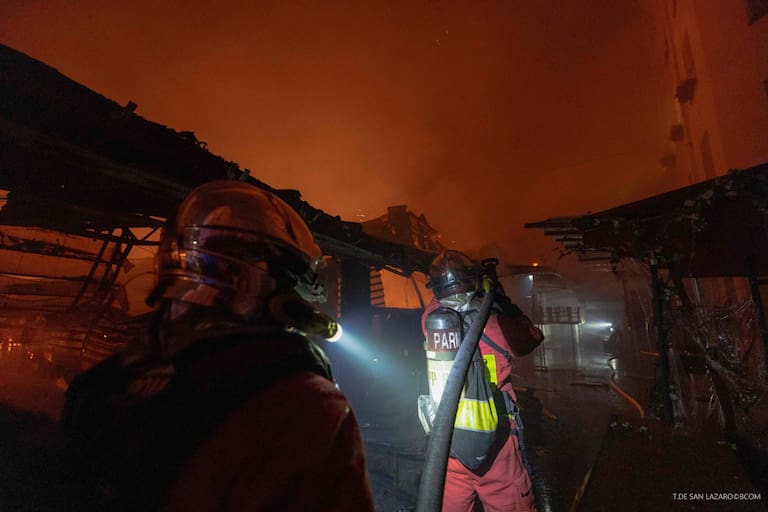 This handout photograph taken by T. de San Lazaro and released by the Brigade des Sapeurs Pompiers de Paris (BSPP) on October 12, 2026, shows firefighters working to extinguish a fire at «Le marche des Enfants Rouges» (Red Children market) center of Paris. (Photo by Handout / Brigade des Sapeurs Pompiers de Paris (BSPP) / AFP) / RESTRICTED TO EDITORIAL USE - MANDATORY CREDIT "AFP PHOTO / - / HANDOUT / BSPP / T. de San Lazaro " - NO MARKETING NO ADVERTISING CAMPAIGNS - DISTRIBUTED AS A SERVICE TO CLIENTS