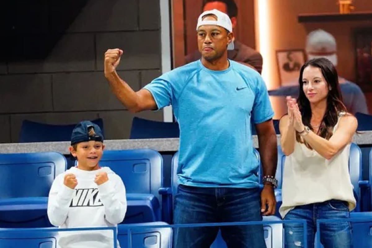 Tiger (acompañado por su hijo Charlie) y Eric durante el US Open 2019, viendo a Rafa Nadal