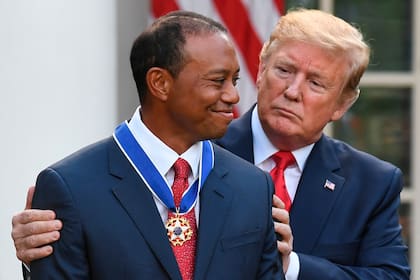 Tiger Woods y Donald Trump.
