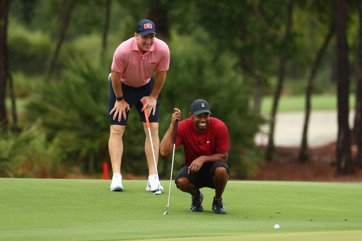 Tiger Woods y el ex jugador de NFL Peyton Manning