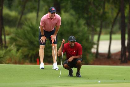 Tiger Woods y el ex jugador de NFL, Peyton Manning