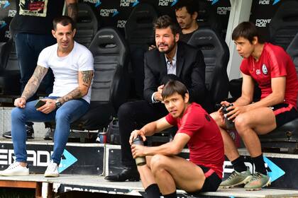 Tinelli, el manager Romagnoli y los hermanos Romero, sobre los que se construirá buena parte de la base del plantel de San Lorenzo