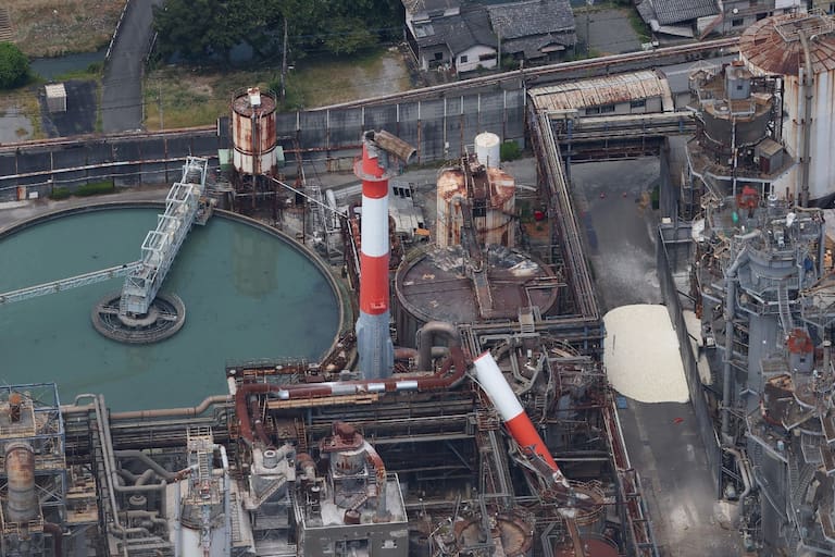 TOPSHOT - Nippon Paper Industries' Yatsushiro Mill, where a chimney collapsed due to the earthquake is seen from a helicopter in Yatsushiro, Kumamoto Prefecture, on July 29, 2026, after an earthquake struck southwestern Japan the previous day. (Photo by JIJI PRESS / AFP) / Japan OUT