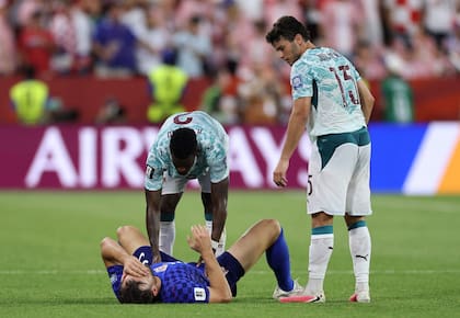 TORONTO, ONTARIO - JULY 02: Nelson Semedo #2 and Joao Neves #15 of Portugal console Duje Caleta-Car #5 of Croatia after the FIFA World Cup 2026 Round of 32 match between Portugal and Croatia at Toronto Stadium on July 02, 2026 in Toronto, Ontario. Buda Mendes/Getty Images/AFP (Photo by Buda Mendes / GETTY IMAGES NORTH AMERICA / Getty Images via AFP)